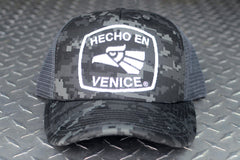 HECHO EN VENICE CAMO TRUCKER HAT